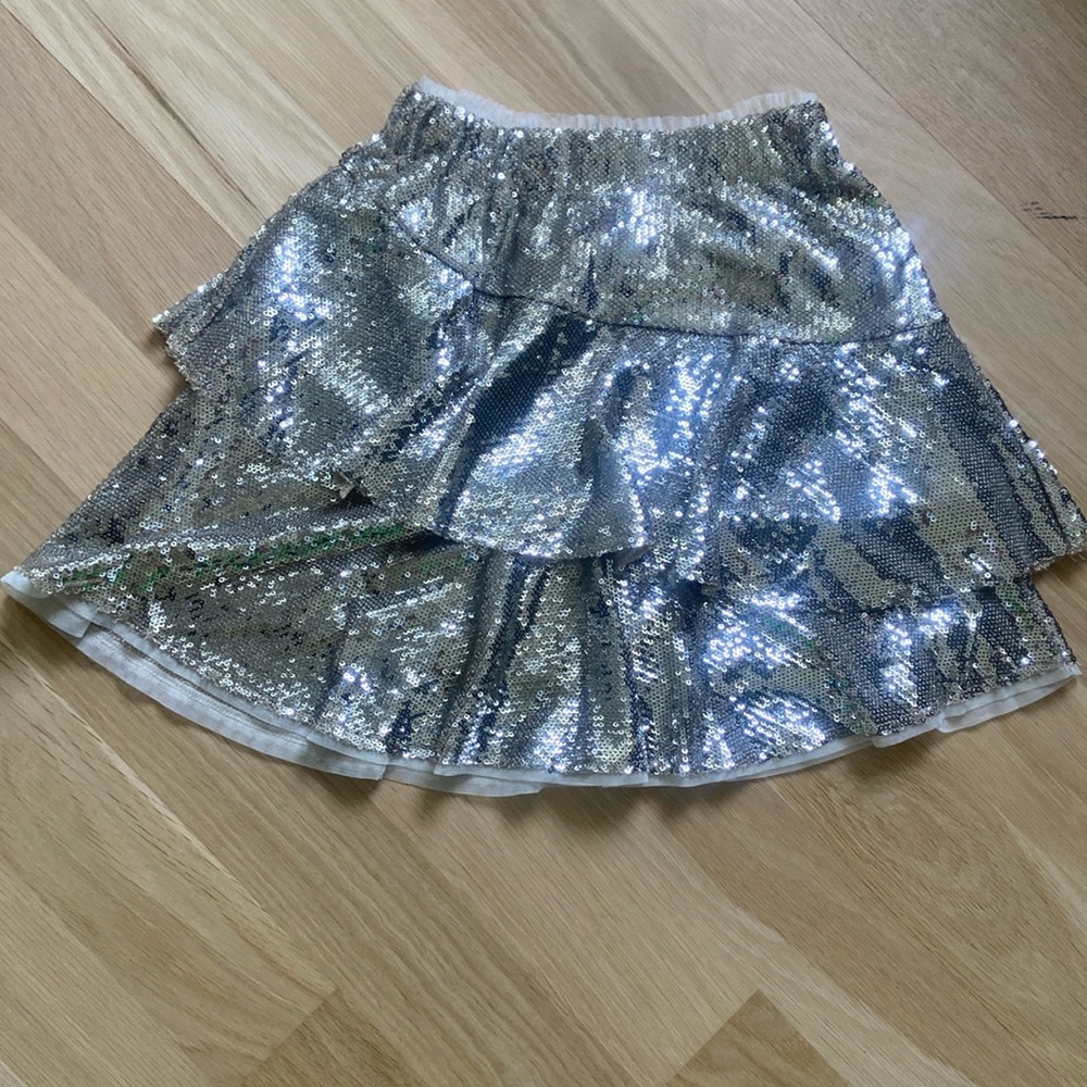 Silver sequin, ruffled skirt. Girls